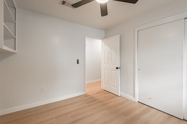 1311 Walnut Bend Dr, Lufkin, TX 75904 - unfurnished bedroom with wood finished floors, a closet, and ceiling fan