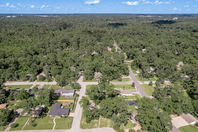 1311 Walnut Bend Dr, Lufkin, TX 75904 - aerial overview of property's location with a heavily wooded area