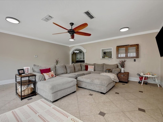 1304 Walnut Bend Dr, Lufkin, TX 75904 - living room featuring ornamental molding, light tile patterned flooring, a ceiling fan, and baseboards