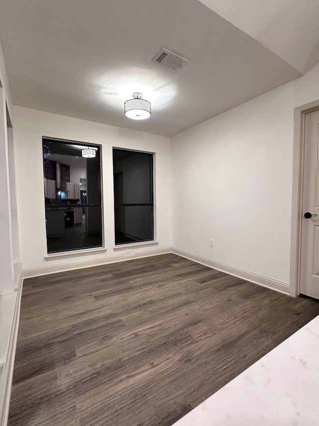 4 Columbia Ct, Lufkin, TX 75901 - unfurnished room with dark wood-style floors and baseboards