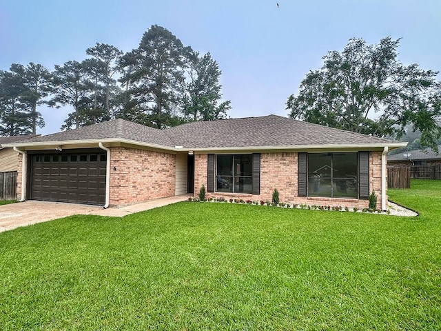 4 Columbia Ct, Lufkin, TX 75901 - single story home featuring an attached garage, brick siding, concrete driveway, and a shingled roof