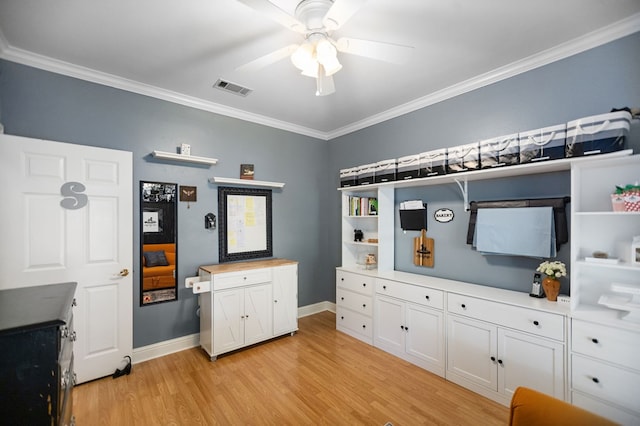703 Shady Ln, Diboll, TX 75941 - bedroom with light wood-type flooring, crown molding, baseboards, and ceiling fan