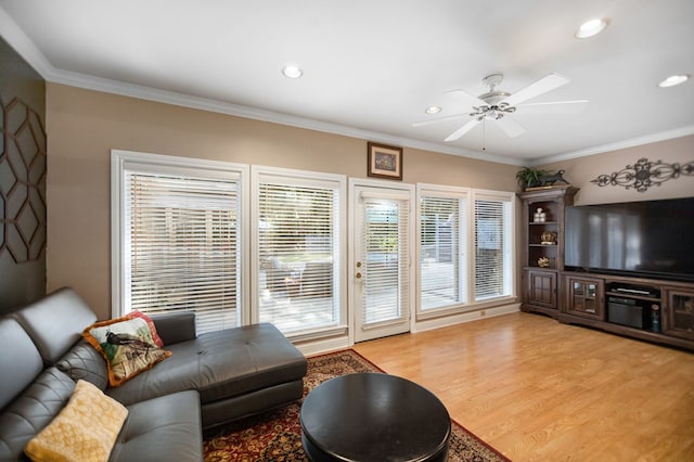 703 Shady Ln, Diboll, TX 75941 - living room featuring a ceiling fan, light wood finished floors, recessed lighting, and ornamental molding