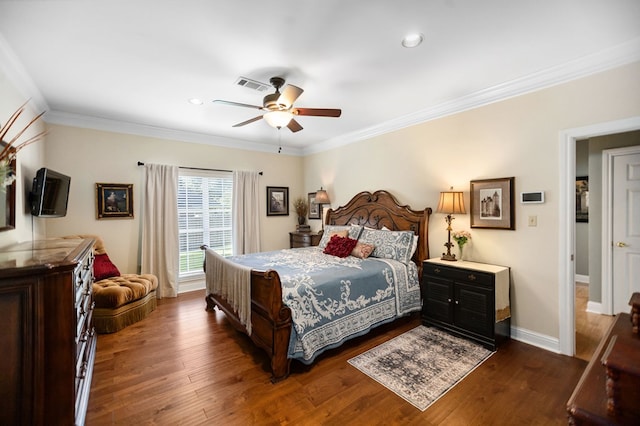 703 Shady Ln, Diboll, TX 75941 - bedroom featuring dark wood-style floors, crown molding, recessed lighting, a ceiling fan, and baseboards