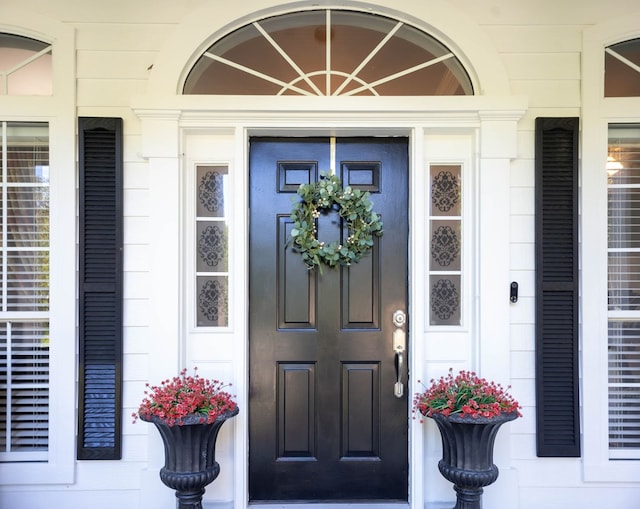 703 Shady Ln, Diboll, TX 75941 - view of exterior entry featuring a porch