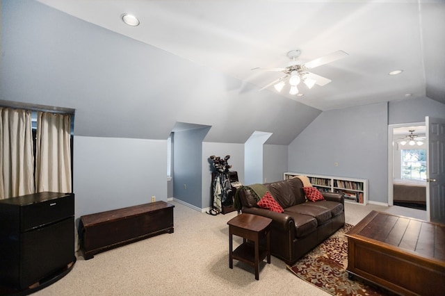 703 Shady Ln, Diboll, TX 75941 - living room with ceiling fan, carpet flooring, lofted ceiling, and baseboards