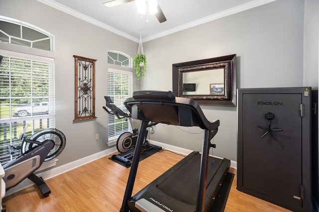 703 Shady Ln, Diboll, TX 75941 - workout area with light wood-style floors, a ceiling fan, ornamental molding, and baseboards