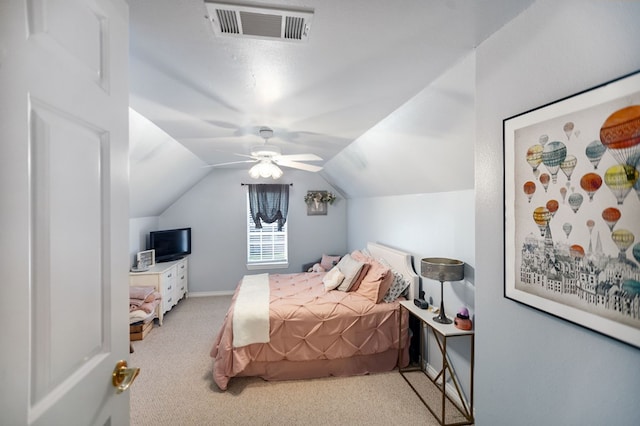 703 Shady Ln, Diboll, TX 75941 - carpeted bedroom with lofted ceiling, a ceiling fan, and baseboards