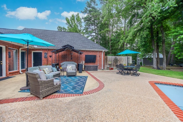 703 Shady Ln, Diboll, TX 75941 - view of patio featuring fence and an outdoor living space