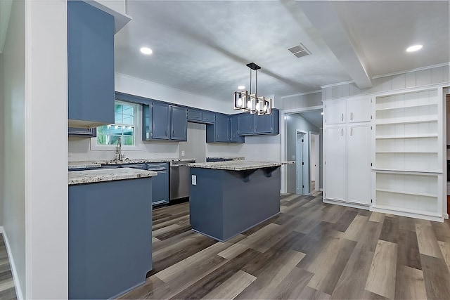 kitchen with visible vents, stainless steel dishwasher, dark wood-style floors, and blue cabinetry