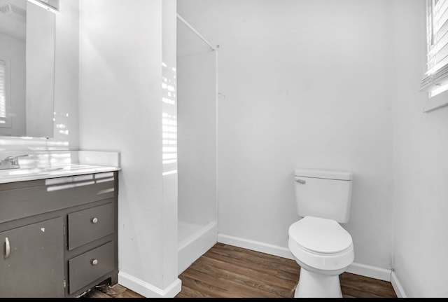 1411 Ryan Chapel Rd, Diboll, TX 75941 - full bath featuring vanity, a shower, and wood finished floors