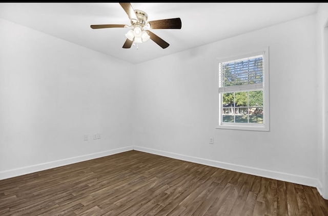 1411 Ryan Chapel Rd, Diboll, TX 75941 - empty room with dark wood finished floors and ceiling fan