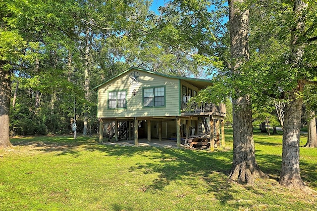 119 W Creekside Dr, Hemphill, TX 75948 - exterior space featuring stairs and a front yard