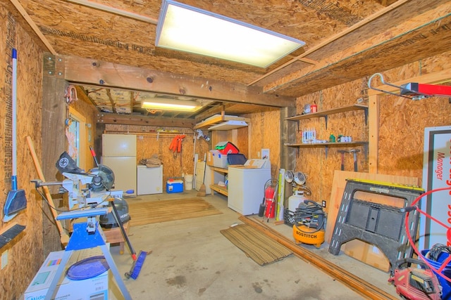 119 W Creekside Dr, Hemphill, TX 75948 - interior space with fridge, washer / clothes dryer, and freestanding refrigerator