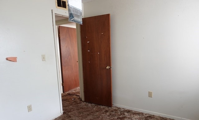 718 Pinewood, Diboll, TX 75941 - hall featuring carpet and baseboards