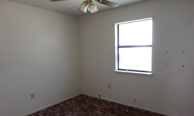 718 Pinewood, Diboll, TX 75941 - spare room with a ceiling fan and carpet flooring
