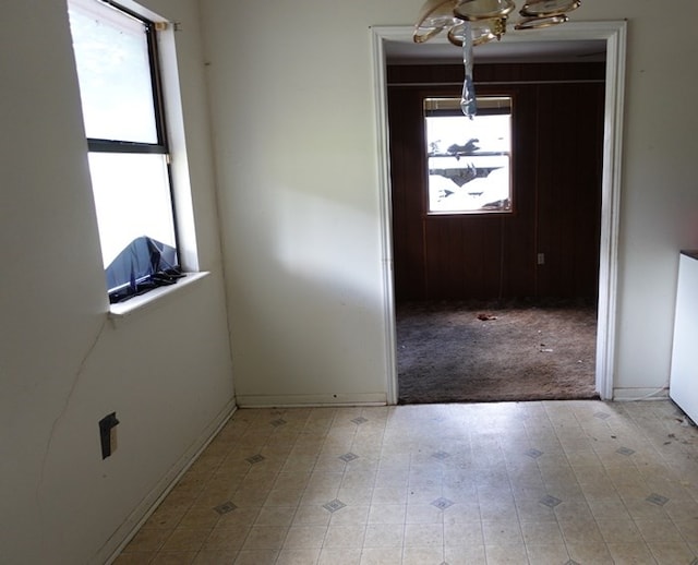 718 Pinewood, Diboll, TX 75941 - empty room featuring a chandelier