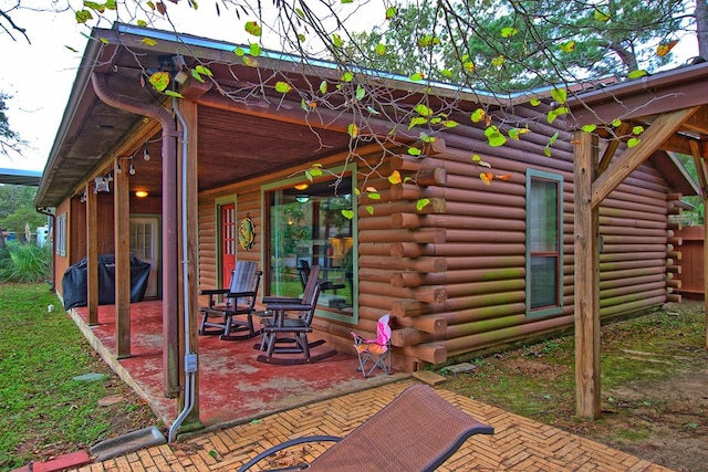 back of house featuring a patio area