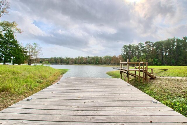 view of dock with a water view