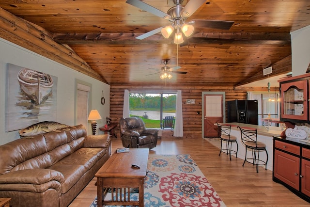 living room with light hardwood / wood-style flooring, lofted ceiling, and wood ceiling