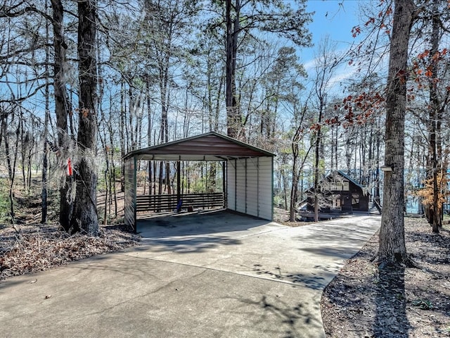 view of parking / parking lot featuring a carport