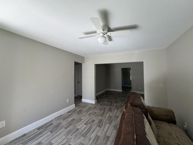 unfurnished living room with ceiling fan and light hardwood / wood-style floors