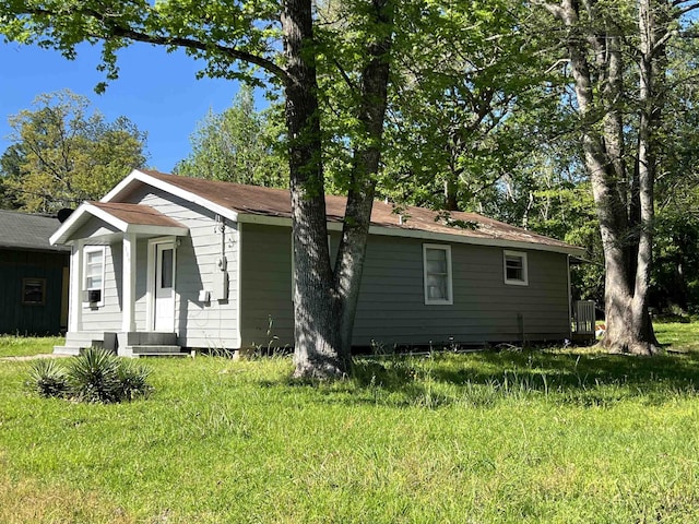 exterior space with a front yard