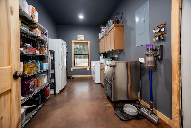 laundry room featuring electric panel, washing machine and dryer, cabinet space, and baseboards