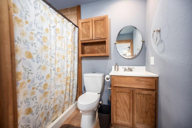 full bath with a shower with curtain, toilet, and vanity