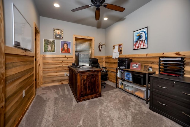 carpeted home office featuring recessed lighting, a ceiling fan, wood walls, and wainscoting