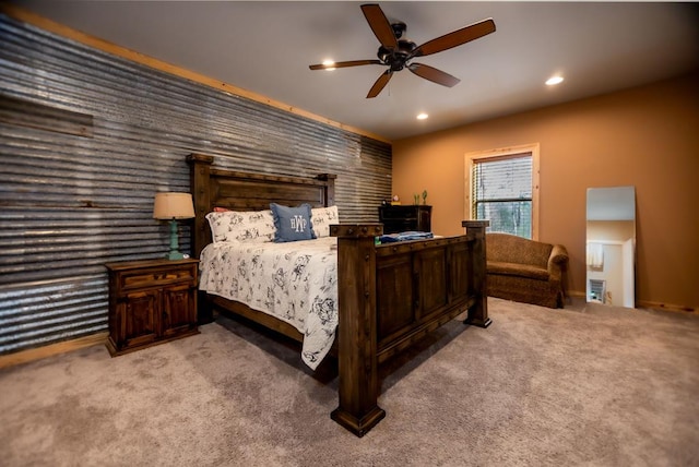 bedroom with recessed lighting, a ceiling fan, an accent wall, and carpet flooring