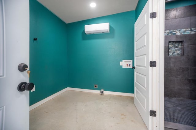 laundry area with hookup for a washing machine, baseboards, hookup for an electric dryer, laundry area, and an AC wall unit