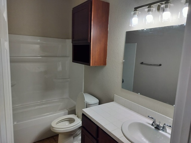 full bathroom with vanity, toilet, and tub / shower combination