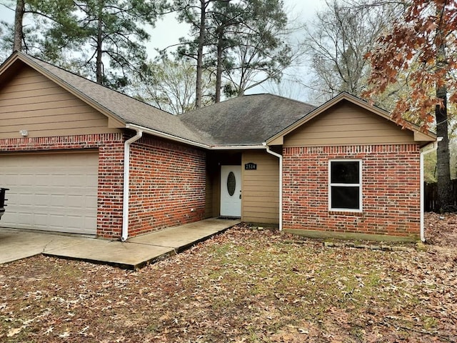 ranch-style home with a garage