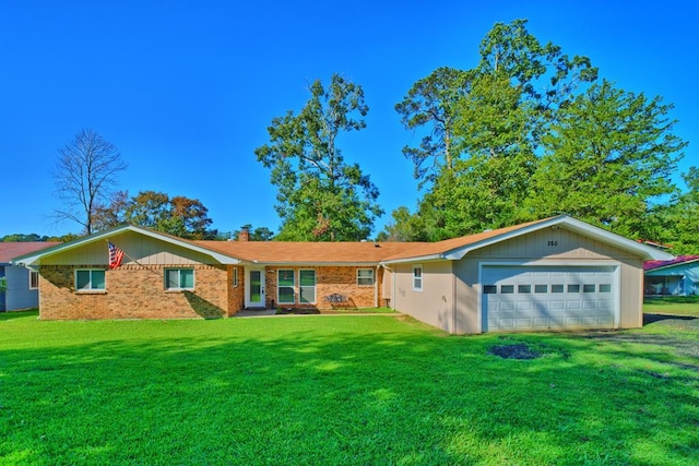 ranch-style house with a garage and a front yard