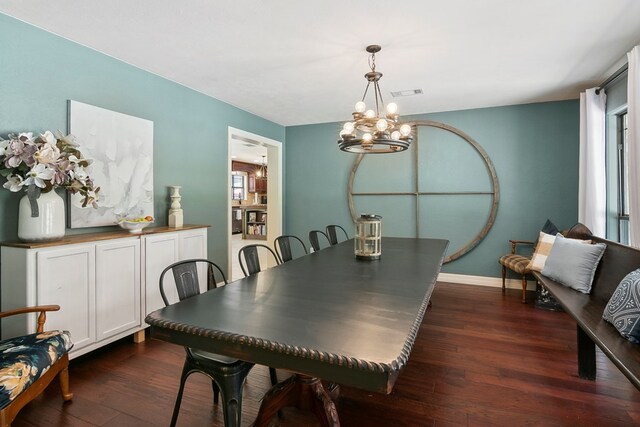 1025 Creek Bend Dr, Jasper, TX 75951 - dining area with a chandelier, dark wood-style floors, and healthy amount of natural light