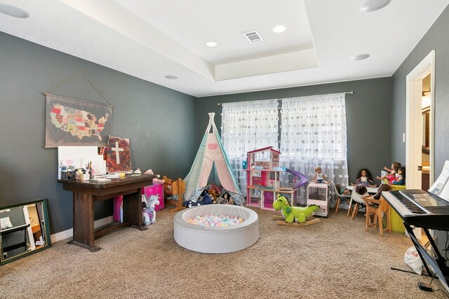 1025 Creek Bend Dr, Jasper, TX 75951 - playroom featuring carpet flooring, recessed lighting, and a tray ceiling