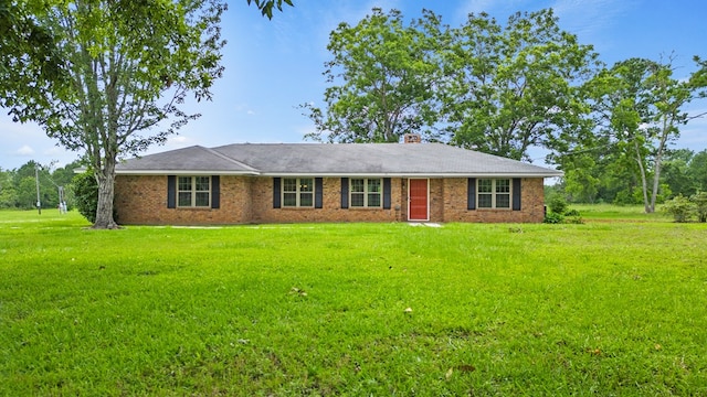 single story home with a front yard