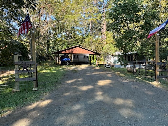 exterior space with a carport