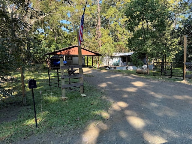 view of home's community with an outbuilding