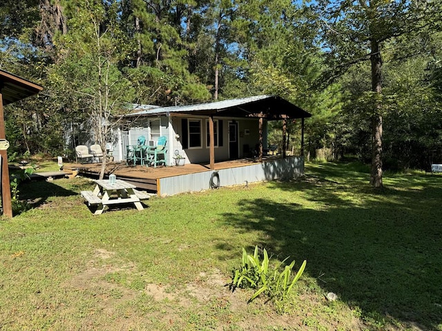 view of yard featuring a wooden deck