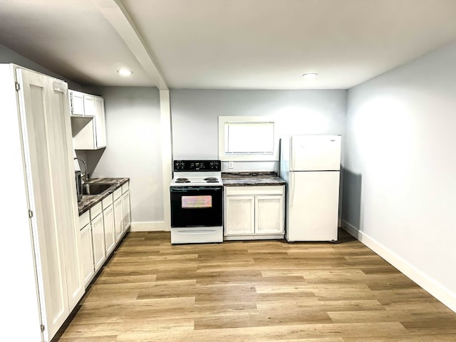 kitchen featuring white cabinets, light wood-type flooring, white appliances, and sink