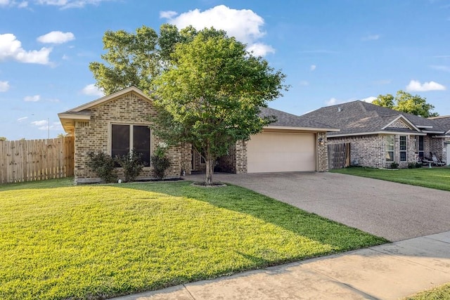 801 Dove Run Trl, College Station, TX 77845 - view of front of house featuring brick siding, an attached garage, and driveway