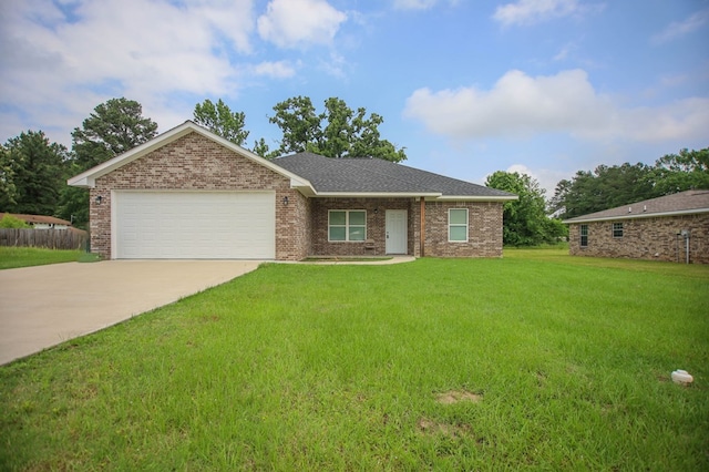 206 Shady Pnes, Lufkin, TX 75901 - view of front of property with driveway, an attached garage, brick siding, and a shingled roof