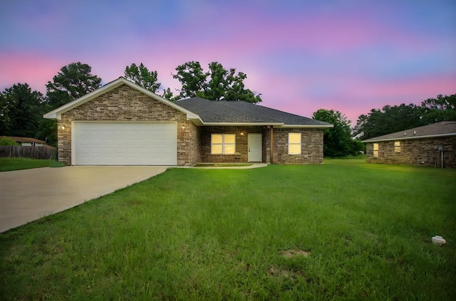 206 Shady Pnes, Lufkin, TX 75901 - ranch-style home with a garage, concrete driveway, a front yard, and brick siding