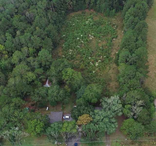 bird's eye view featuring a forest view