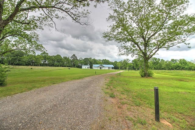 view of road featuring driveway