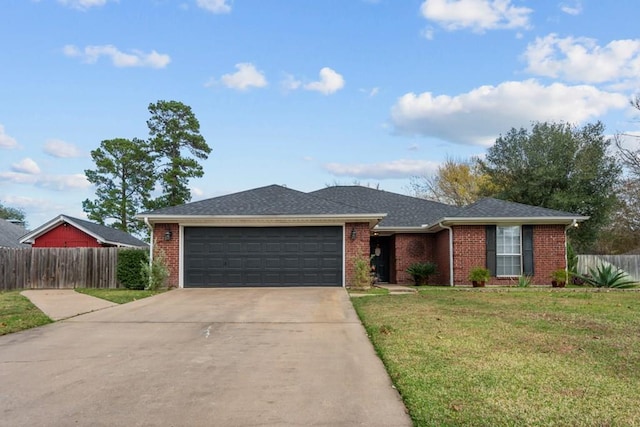 single story home with driveway, an attached garage, fence, a front yard, and brick siding