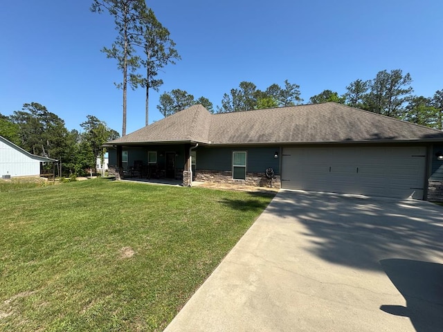 3640 Wingate Blvd, Brookeland, TX 75931 - single story home featuring an attached garage, driveway, a front yard, stone siding, and roof with shingles