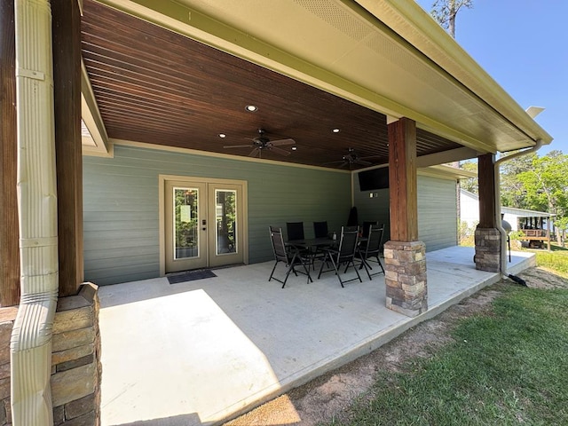 3640 Wingate Blvd, Brookeland, TX 75931 - view of patio featuring a ceiling fan and french doors